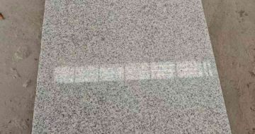 肇庆芝麻白光面毛板