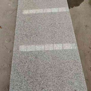 肇庆芝麻白光面毛板